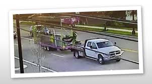 A near by traffic camera got a photo of the truck driving off with the stolen Go-Gator ride. 