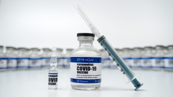 COVID-19 Vaccine. COVID-19 Corona Virus 2019-ncov Vaccine Injection Vials Medicine bottles. Vaccination, immunization, treatment to cure Covid-19 Corona Virus infection. Healthcare And Medical concept