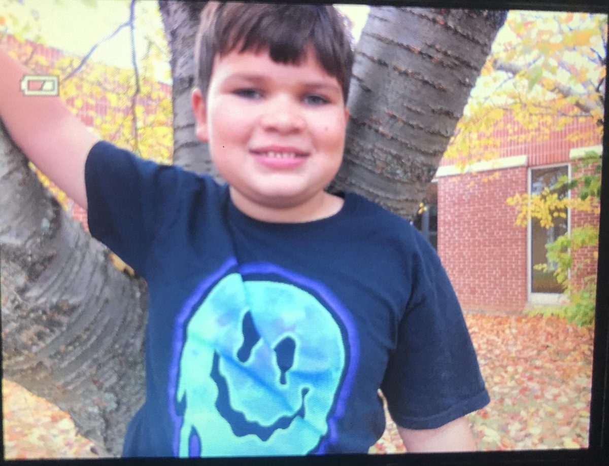 A young student enjoys a fall day outside at DPA at Penns Valley Elementary School. 