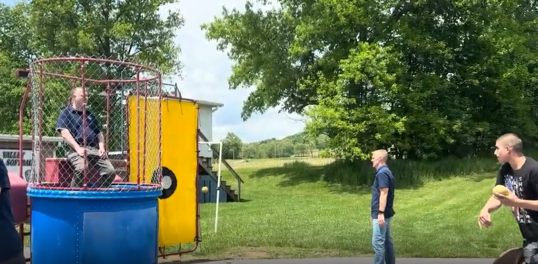 A student trying to dunk Mr. Romanyshyn